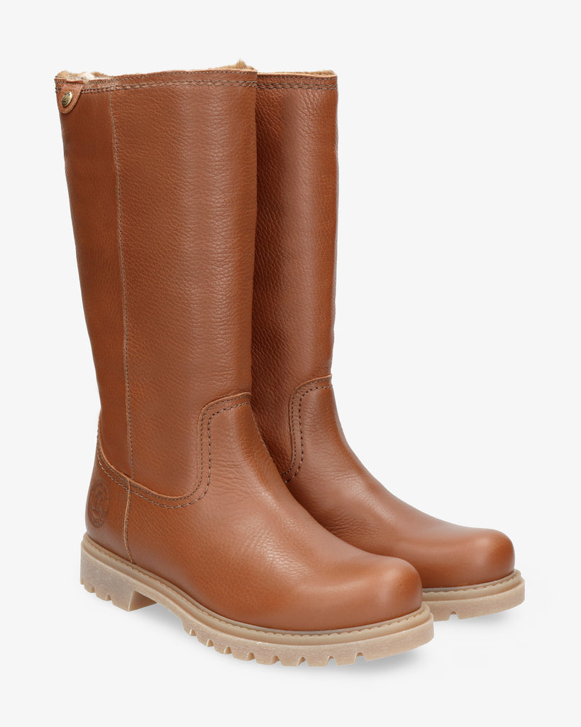 Bambina botas de piel con forro interior de pelo. cuero