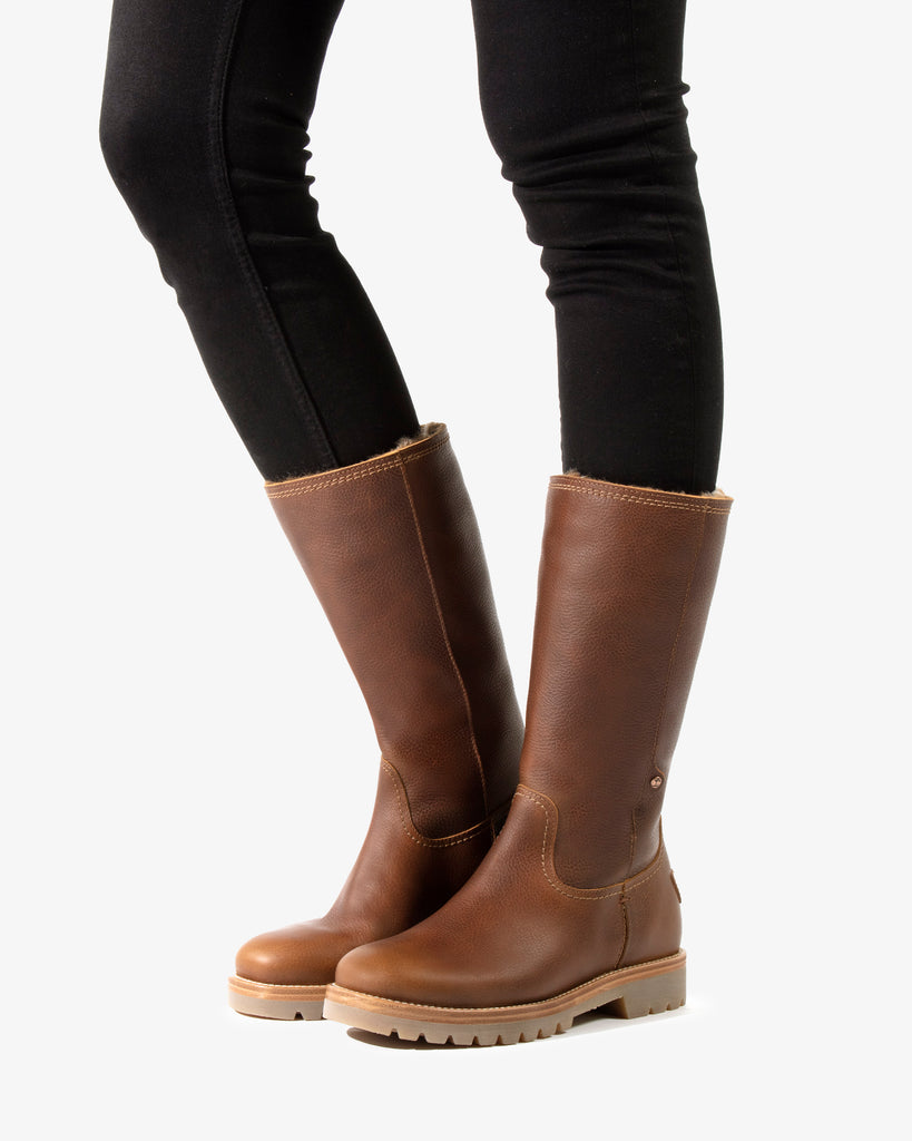 Bambina botas de piel con forro interior de pelo. cuero