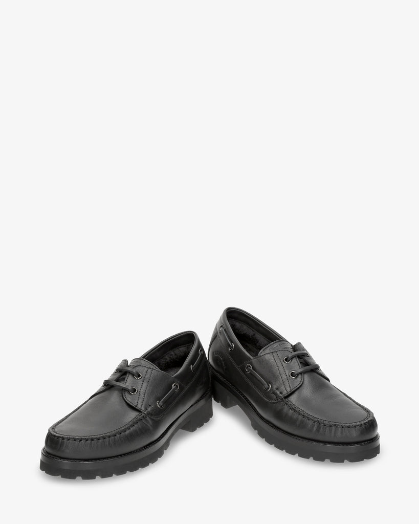 Boat Igloo náutico de piel con forro interior de pelo natural. negro