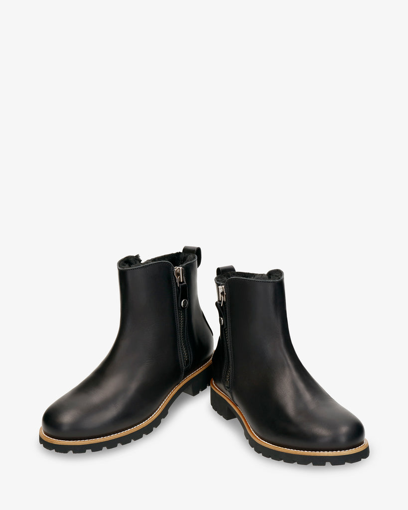 Fiore Trav botas de piel con forro interior de pelo. negro