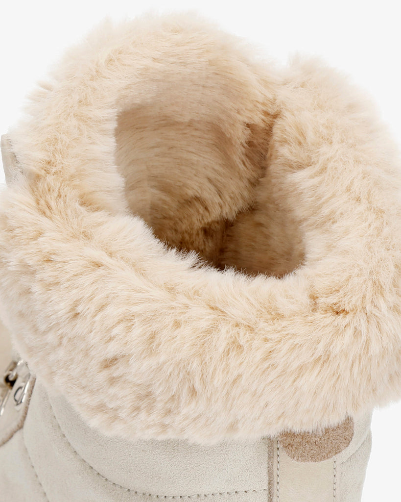 Tuscani botas de piel con forro interior de pelo. crudo